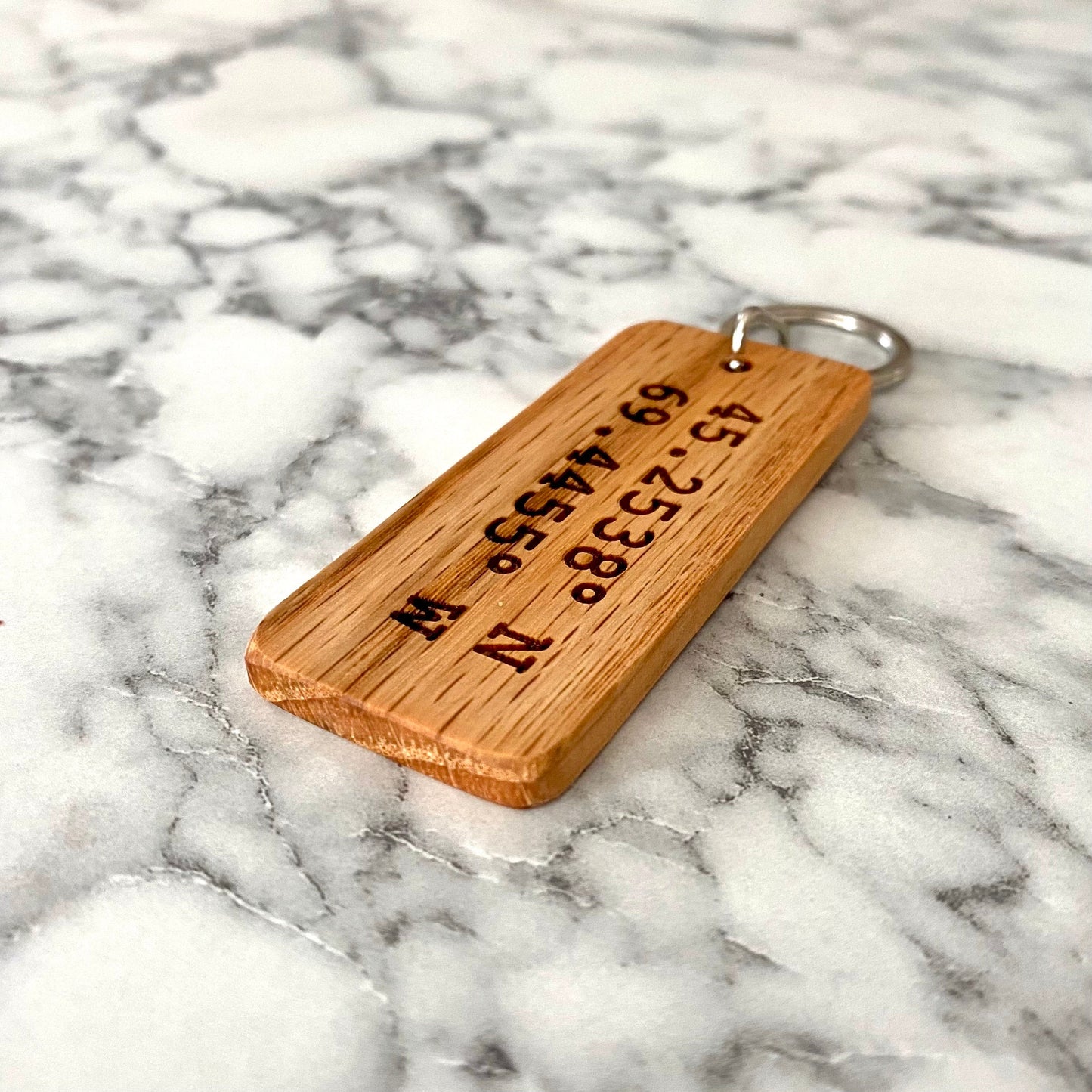 GPS coordinates engraved wood keychain close-up | Mrs Gift