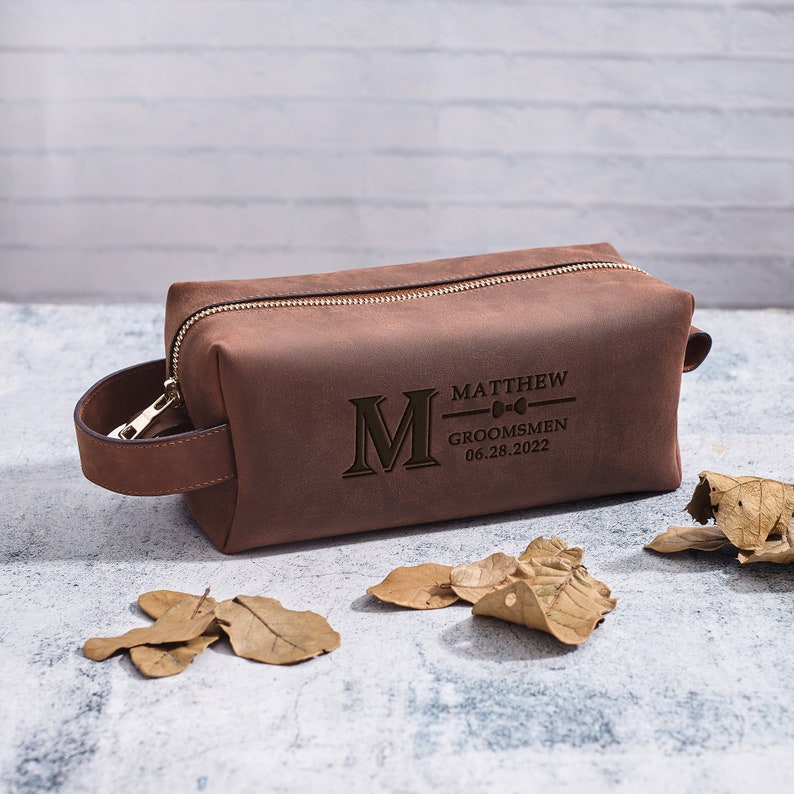 Custom engraved leather toiletry bag with name and date in light brown | Mrs Gift