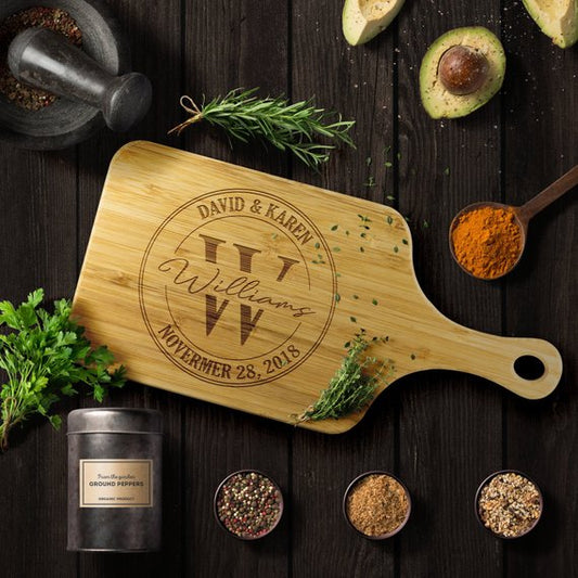 Custom engraved cutting board with family name and wreath design | Mrs Gift